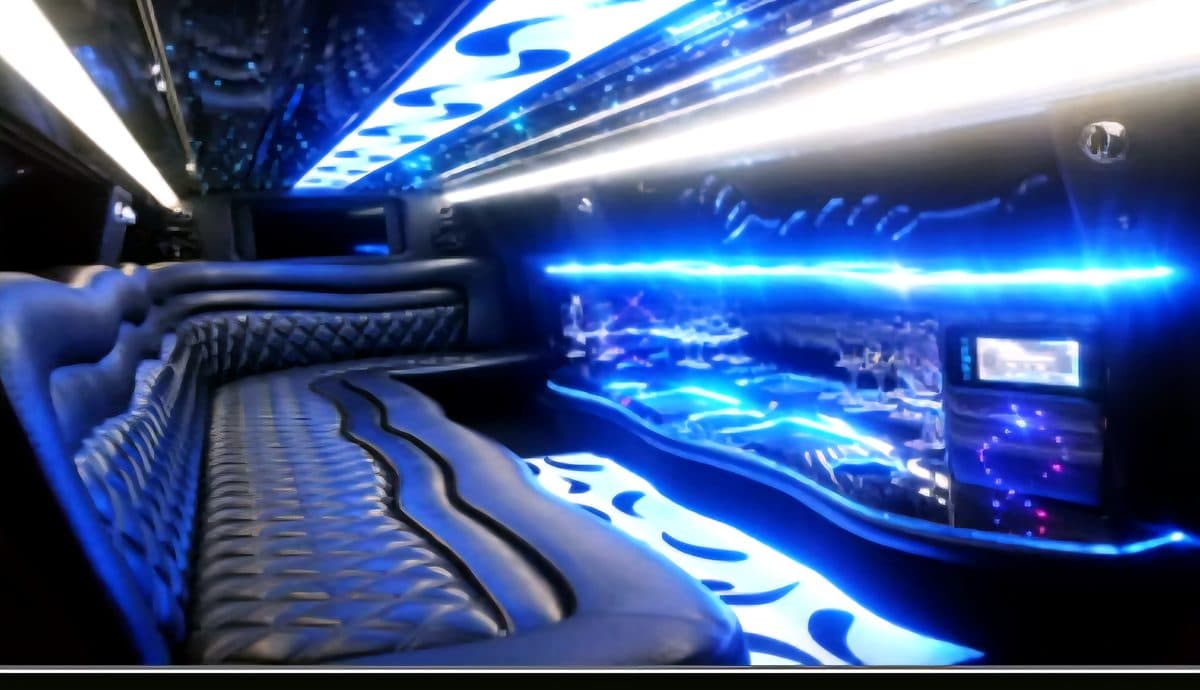Chrysler 300 stretch limousine interior under blue LED lighting