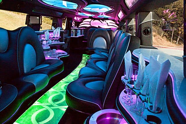 Interior bar of the 2012 Escalade super stretch under coloured lighting