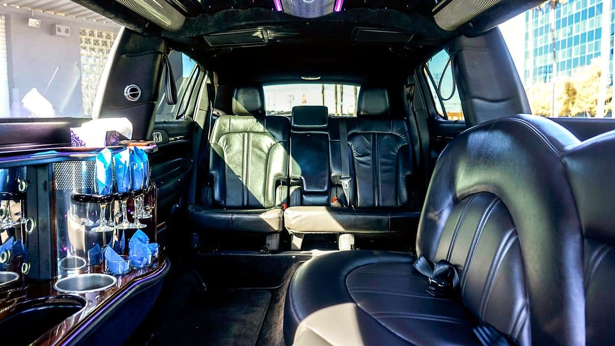 Lincoln MKT stretch limousine interior with bar