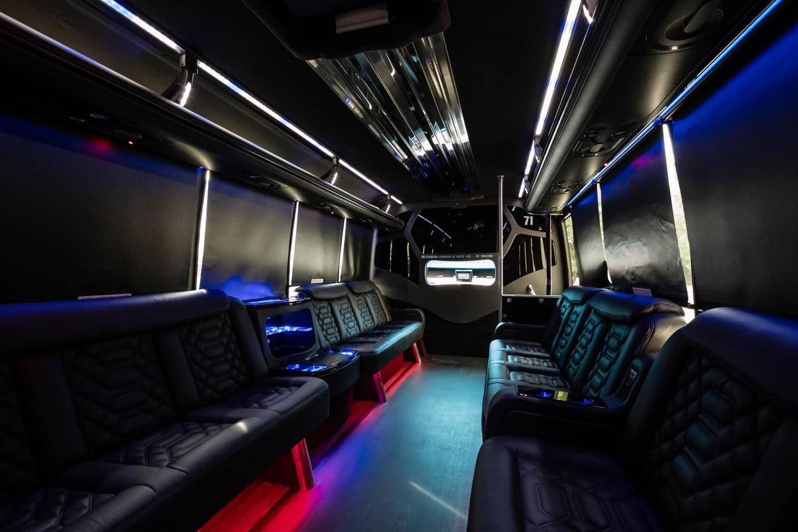 Party bus interior with LED lighting and lounge seating